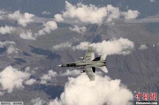 资料图：俄罗斯、美国及加拿大联合举行“2013-警觉之鹰”联合反恐演习。图为加拿大空军的F-18战机参加演习。