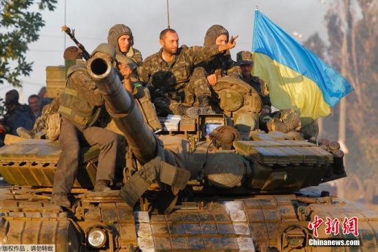 普京称将继续助解决乌克兰危机 突出停火重要性 