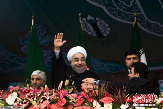 资料图：伊朗总统鲁哈尼(左二)。