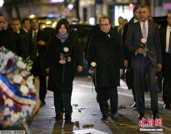 当地时间11月30日，法国巴黎，参加巴黎气候大会的多国领导人前往巴塔克兰剧院前献花，悼念巴黎<a href=