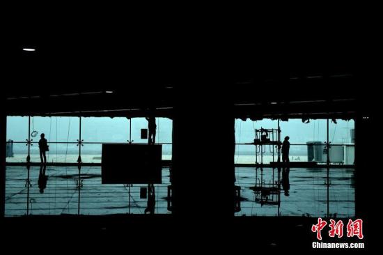 资料图:正在建设的重庆机场东航站区。<a target='_blank' href='http://www.chinanews.com/'>中新社</a>记者 陈超 摄 资料图:正在建设的重庆机场东航站区。<a target='_blank' href='http://www.chinanews.com/'>中新社</a>记者 陈超 摄