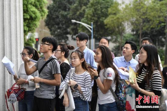 China's 2024 national civil servant exams begin with candidates, vacancies hitting record high