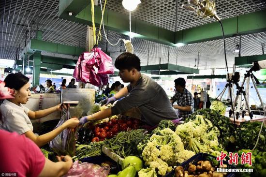 资料图：菜市场。葛宜年 摄 图片来源：视觉中国