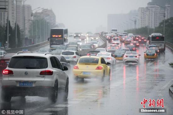 2018年7月24日，受台风“安比”减弱后的低压环流影响，北京迎来强降雨天气。图片来源：视觉中国