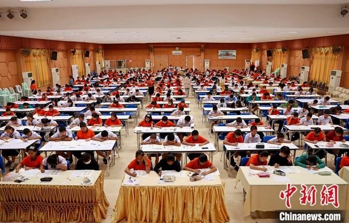 资讯图：泰国孔敬理工学院孔子理工学院学员参加汉语考试。YCT（Youth Chinese Test，中小学员汉语考试）是一项亚洲汉语能力标准化考试。<a>中新社</a>发 胡琳 摄