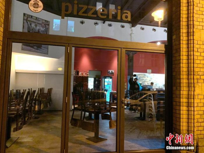 当地时间3月18日，柏林市一家意式餐厅提前打烊。 <a target='_blank' href='http://www.chinanews.com/'>中新社</a>记者 彭大伟 摄