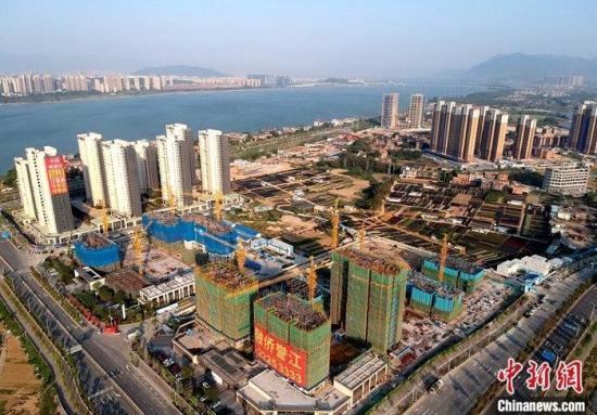 Major Chinese cities ease housing policies as government support takes effect