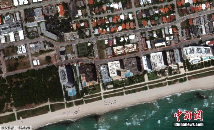 图为2021年3月11日迈阿密-戴德县高层公寓的卫星图片。