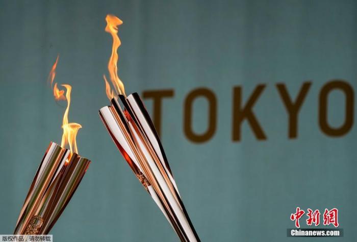 资料图：当地时间7月9日，东京奥运会圣火抵达日本东京都，圣火迎接仪式在驹泽奥林匹克公园体育场举行。