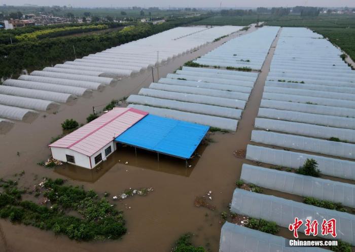 资料图：被淹的房屋农田。(航拍图片) <a target='_blank' href='http://www.chinanews.com/'>中新社</a>记者 　邹浩 摄 　 　
