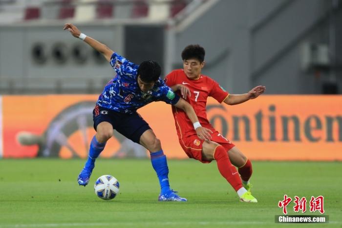 世预赛国足与日本队比赛中。图片来源：视觉中国