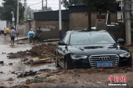 At least 20 killed in North China's persistent downpours