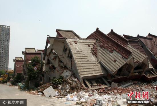 资料图：拆除危旧房屋。秦人 摄 图片来源：视觉中国