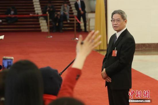 3月5日，中共中央台办、国务院台办主任张志军在十三届全国人大一次会议的“部长通道”上接受媒体采访。 中新社记者 韩海丹 摄