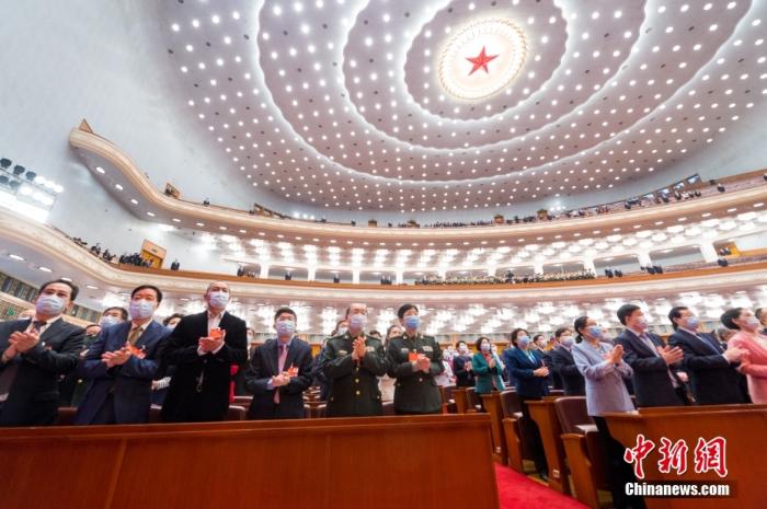 3月10日，全国政协十三届五次会议在北京人民大会堂举行闭幕会。 中新社发 王达 摄